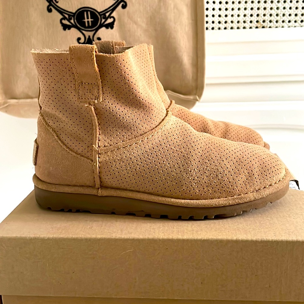 Gently worn UGG unlined perforated mini